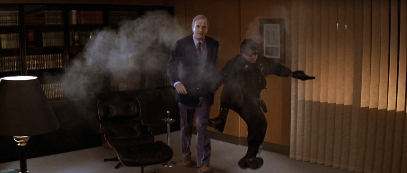 John Cleese as Q breaking up 007's virtual training exercise in Die Another Day (2002)