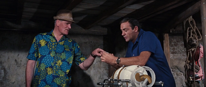Desmond Llewelyn as Q, his loud shirt as a fashion statement and Sean Connery as James Bond in Thunderball (1965)