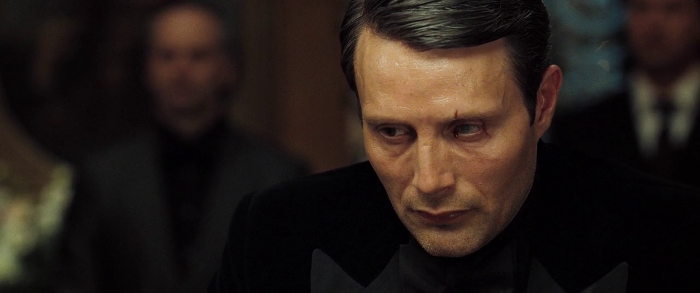 Le Chiffre loses and is crushed, shedding a (bloody) tear