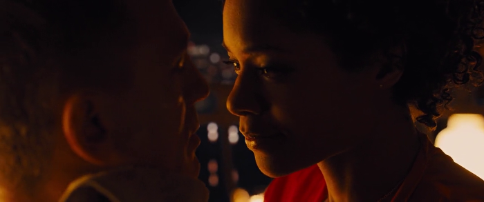 Eve Moneypenny (Naomie Harris) shaves James Bond (Daniel Craig) with a straight razor in Skyfall (2012)